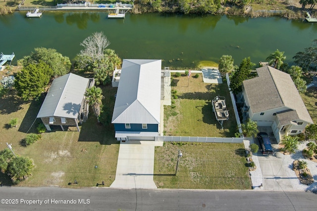 drone / aerial view featuring a water view