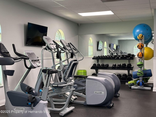 gym with a drop ceiling