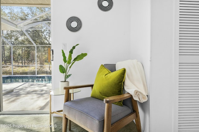 sitting room featuring a swimming pool