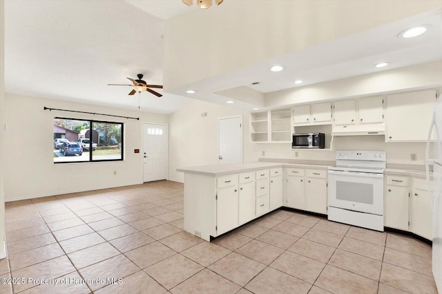 kitchen featuring electric range, white cabinetry, and kitchen peninsula