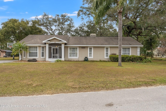 ranch-style house with a front yard