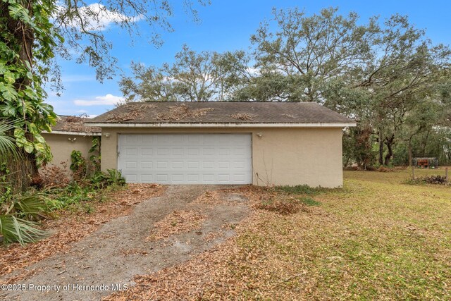 37351 Neighbors Path, Zephyrhills, FL 33542 - garage with a yard