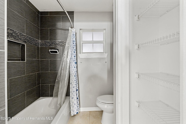 37351 Neighbors Path, Zephyrhills, FL 33542 - bathroom featuring shower / tub combo, tile patterned floors, and toilet