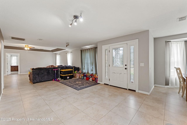 37351 Neighbors Path, Zephyrhills, FL 33542 - entryway with ceiling fan and light tile patterned floors