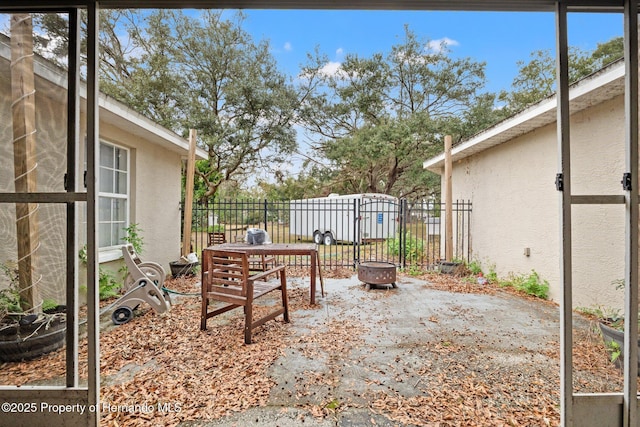 37351 Neighbors Path, Zephyrhills, FL 33542 - view of patio / terrace with an outdoor fire pit