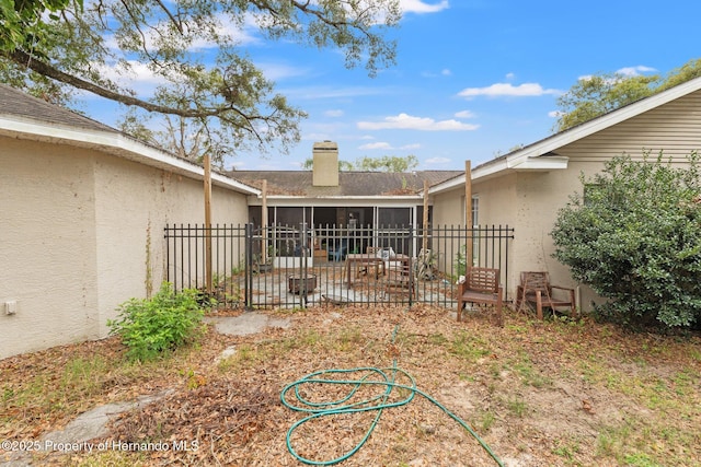 37351 Neighbors Path, Zephyrhills, FL 33542 - view of yard with a sunroom and a patio area