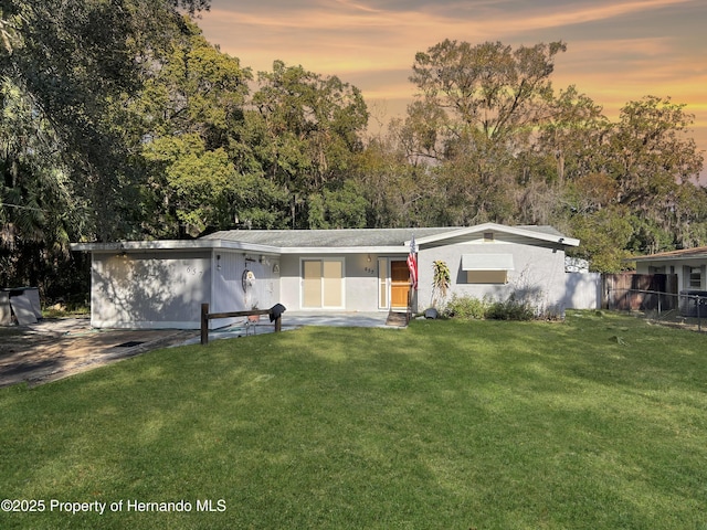 view of front of home featuring a yard