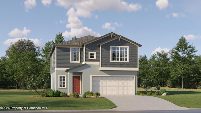 view of front of property with a front yard and a garage