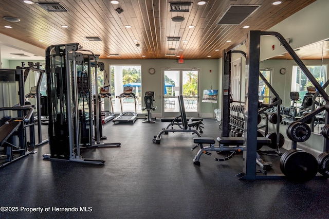 workout area with wood ceiling