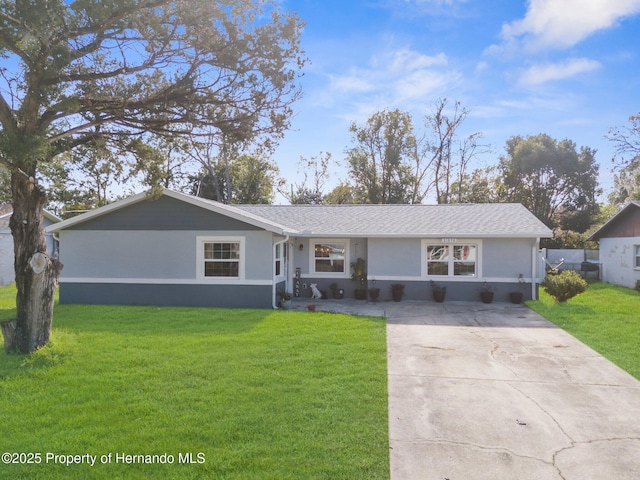 ranch-style home with a front yard