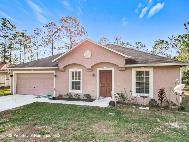 single story home featuring a garage