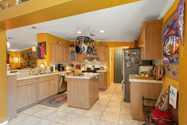 kitchen with ornamental molding, stainless steel appliances, a center island, and sink