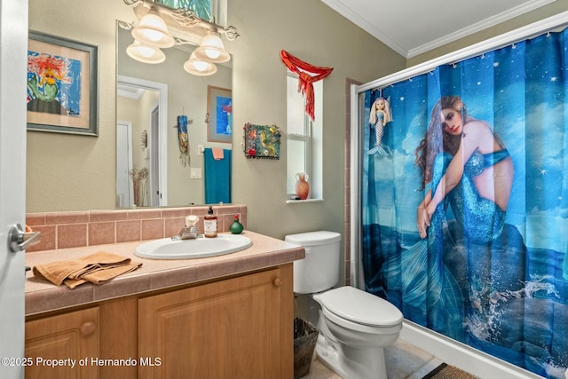 bathroom featuring crown molding, vanity, toilet, and decorative backsplash