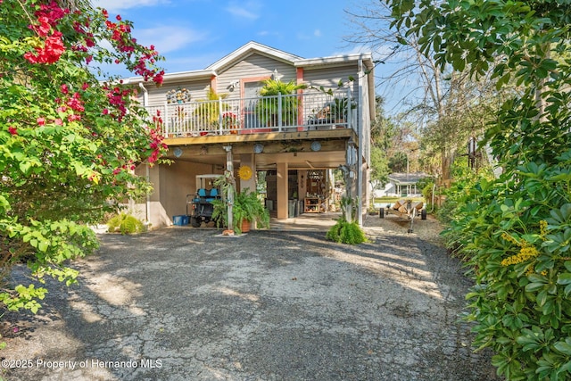 rear view of house with a deck