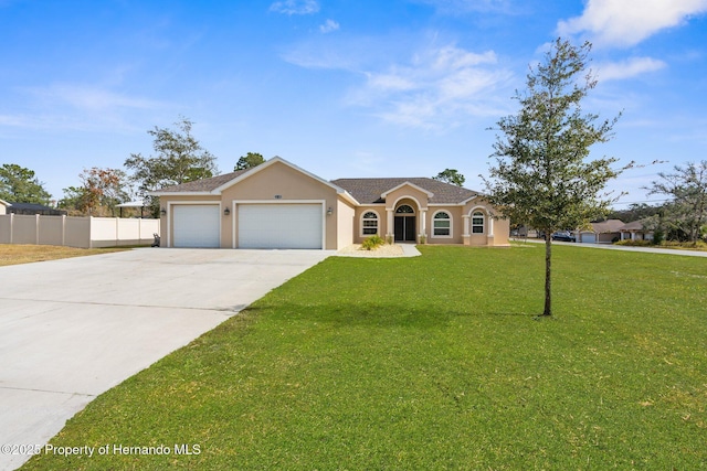 ranch-style house featuring a garage and a front lawn