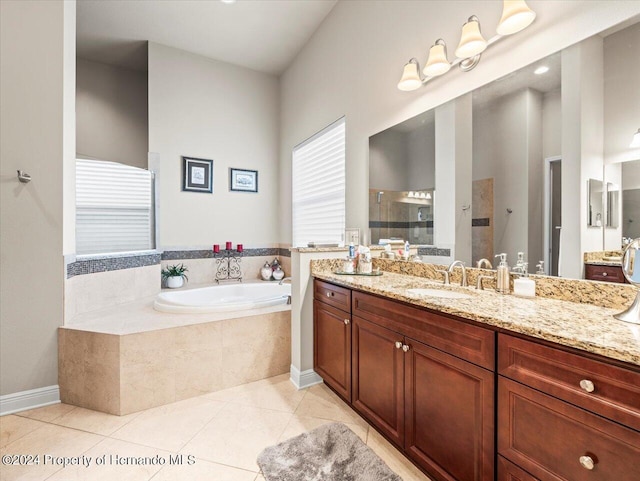 bathroom with separate shower and tub, tile patterned flooring, and vanity