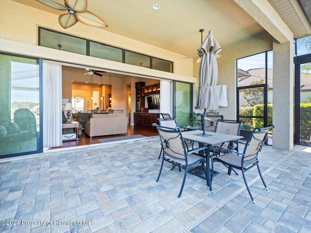 view of patio / terrace featuring ceiling fan