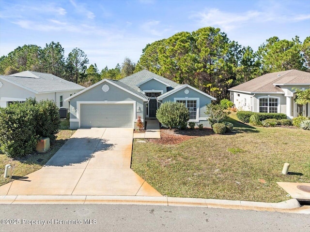 single story home with a front yard and a garage