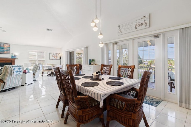 dining area with a healthy amount of sunlight and light tile patterned floors