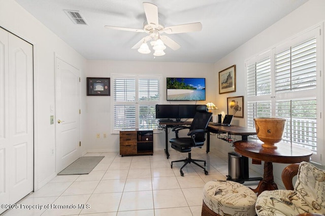 tiled office with ceiling fan