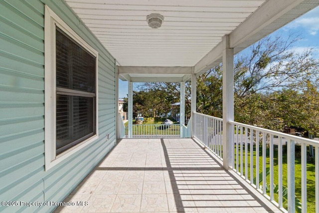 view of patio featuring a porch