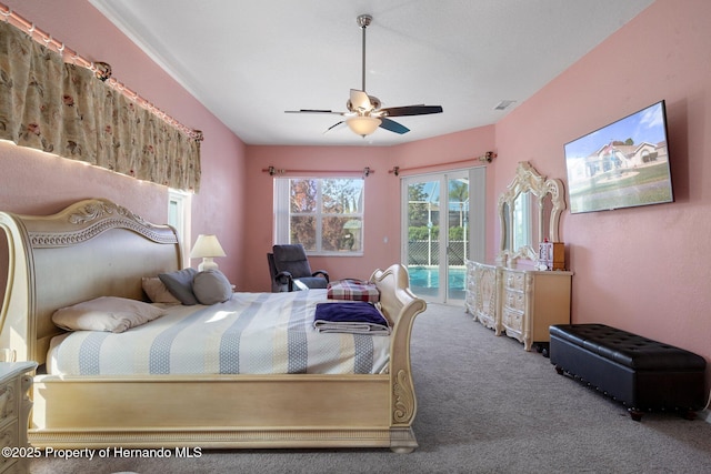 carpeted bedroom featuring ceiling fan and access to outside