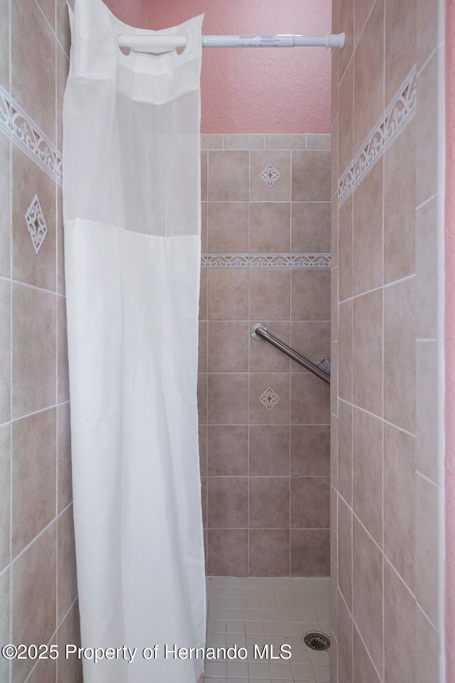 bathroom with a shower with curtain