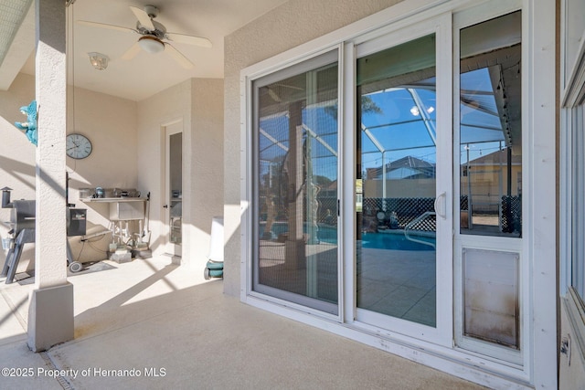 view of patio with exterior kitchen and ceiling fan