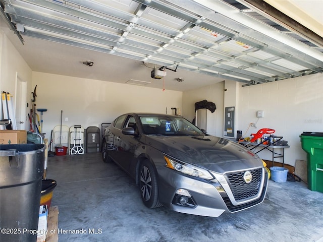 garage featuring a garage door opener