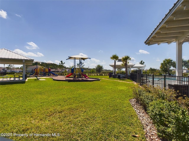 view of yard featuring a gazebo and a playground