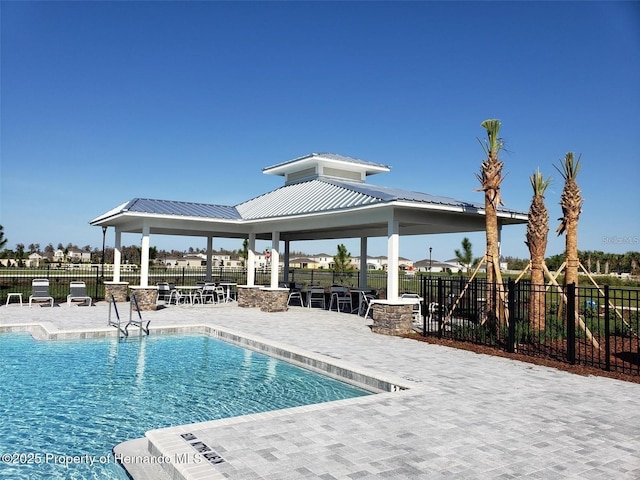 view of pool with a gazebo and a patio area