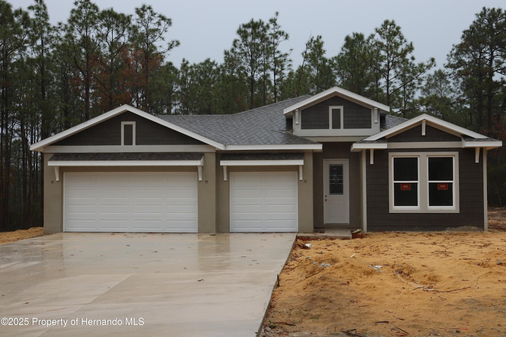 view of front of home featuring a garage