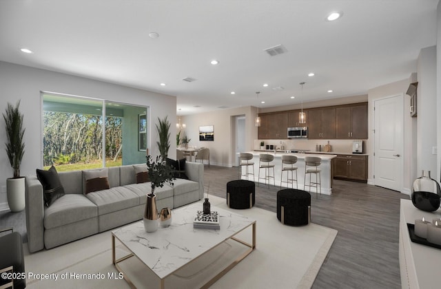 living room with hardwood / wood-style flooring