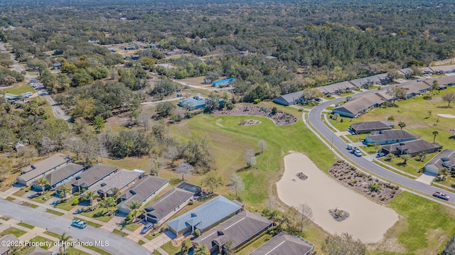 bird's eye view featuring a residential view and a view of trees