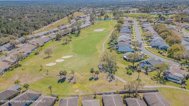 aerial view with a residential view and view of golf course