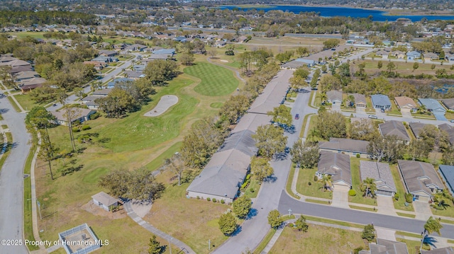 bird's eye view with a residential view and a water view