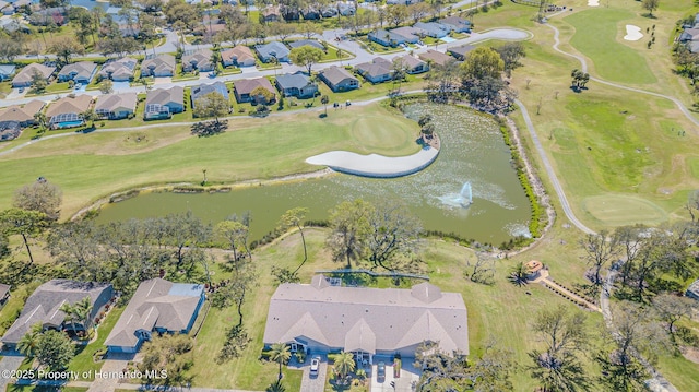 bird's eye view with a residential view, view of golf course, and a water view