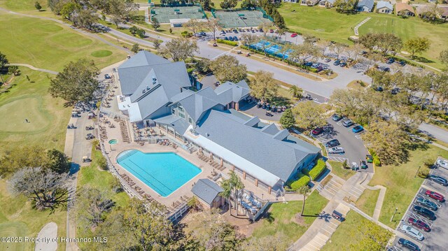 birds eye view of property featuring view of golf course