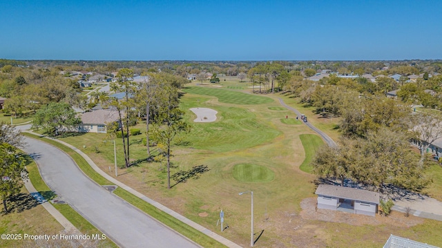 birds eye view of property featuring view of golf course