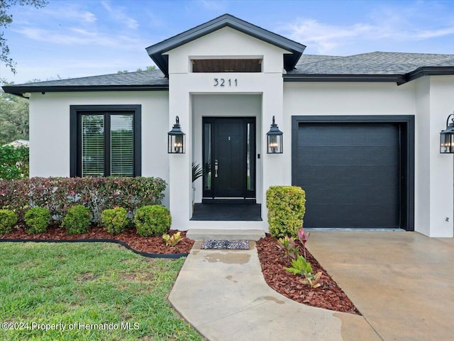 entrance to property with a garage