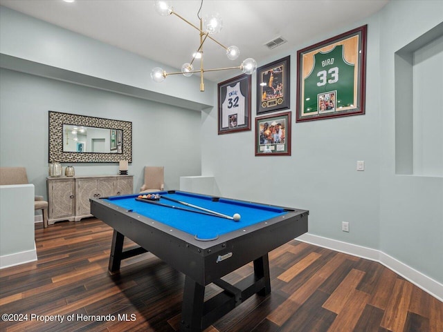 rec room with dark hardwood / wood-style floors, billiards, and an inviting chandelier