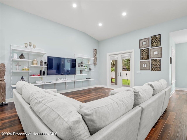 living room with wood-type flooring and lofted ceiling