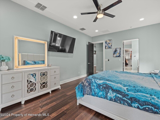 bedroom with ceiling fan and dark hardwood / wood-style floors