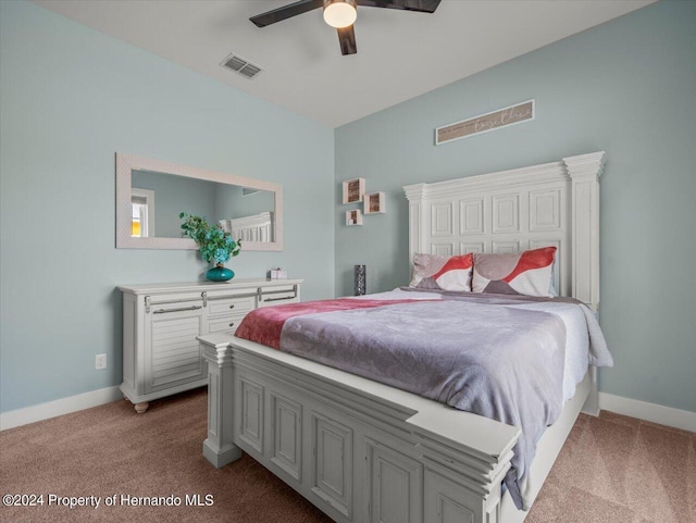 bedroom with light colored carpet and ceiling fan