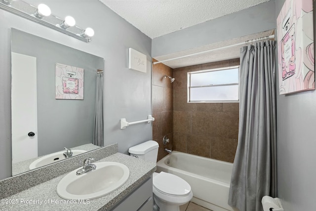 full bathroom with vanity, toilet, shower / bath combo with shower curtain, and a textured ceiling