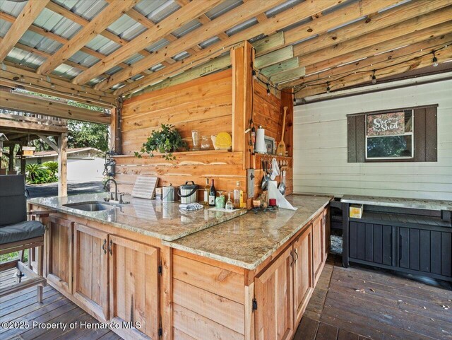 exterior space featuring an outdoor wet bar