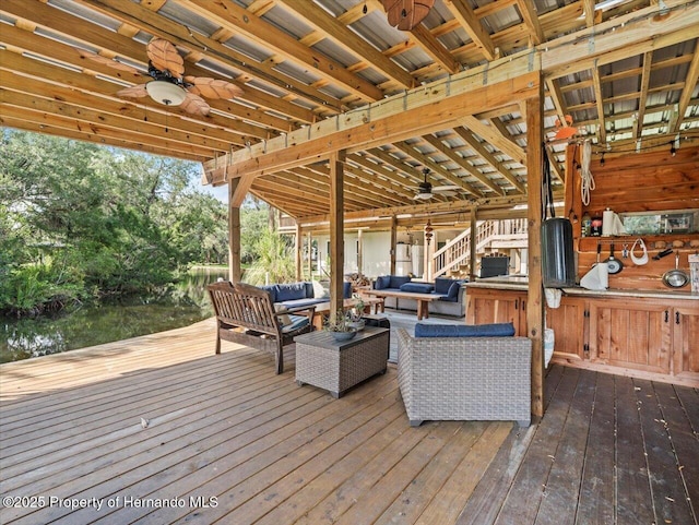 wooden deck featuring outdoor lounge area