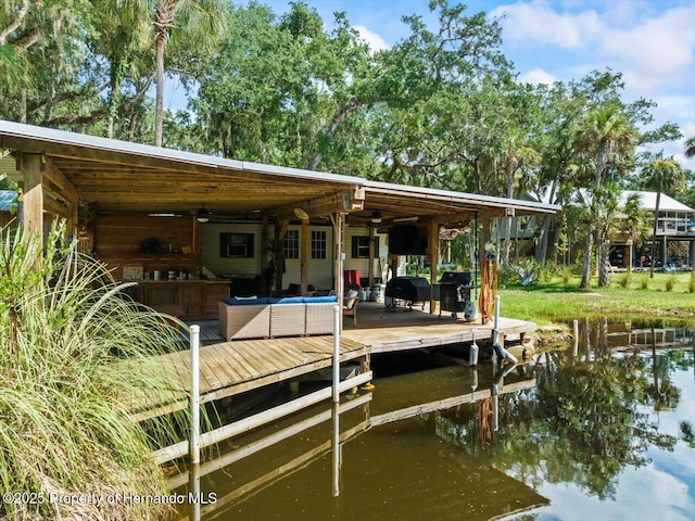 view of dock with a water view