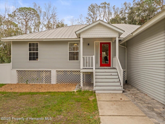 view of front of home with a front lawn