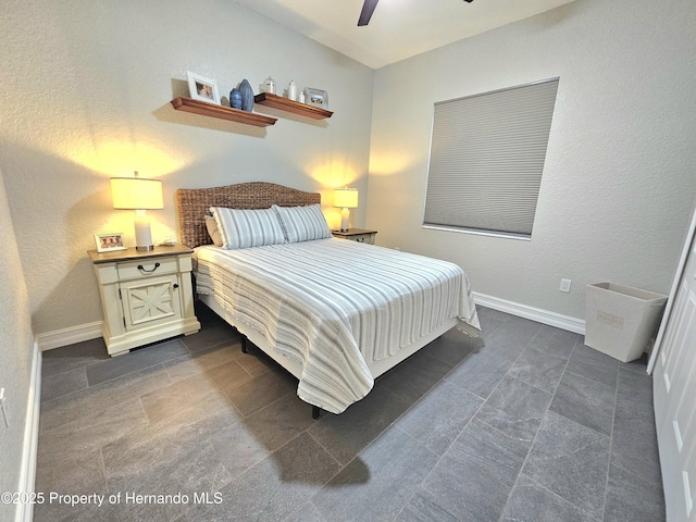 bedroom featuring ceiling fan